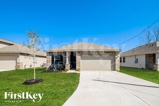 255 Rd 5102F in Cleveland, TX - Building Photo