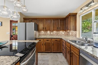 82-5909-5909 Coffee Royal Pl in Captain Cook, HI - Building Photo - Building Photo