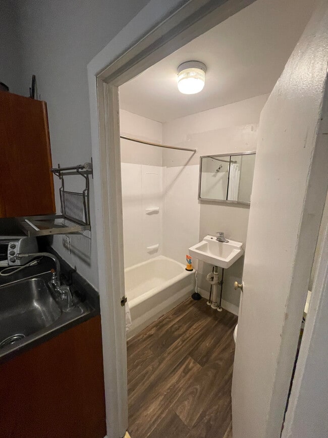 2841 N Calvert St, Unit 1F in Baltimore, MD - Foto de edificio - Building Photo
