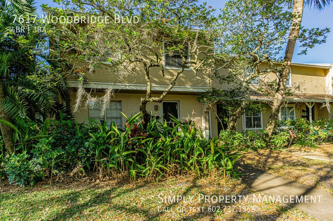 property at 7617 Woodbridge Blvd