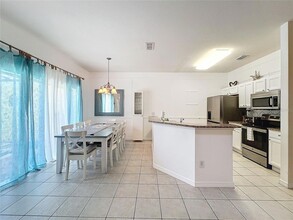 8570 Bay Lilly Loop, Unit 1302 in Kissimmee, FL - Building Photo - Building Photo