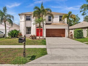 1039 Aviary Rd in Wellington, FL - Foto de edificio - Building Photo