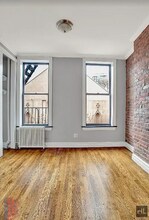 MOTT ST., Unit 13 in New York, NY - Building Photo - Building Photo