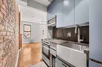 410 E 13th St in New York, NY - Building Photo - Building Photo