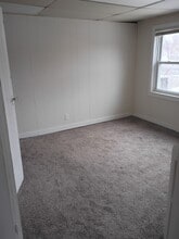 118 N Riverview Dr, Unit Apt 3 in Parchment, MI - Foto de edificio - Building Photo