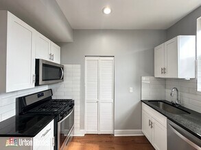 1149 W Lunt Ave, Unit A01K in Chicago, IL - Foto de edificio - Building Photo