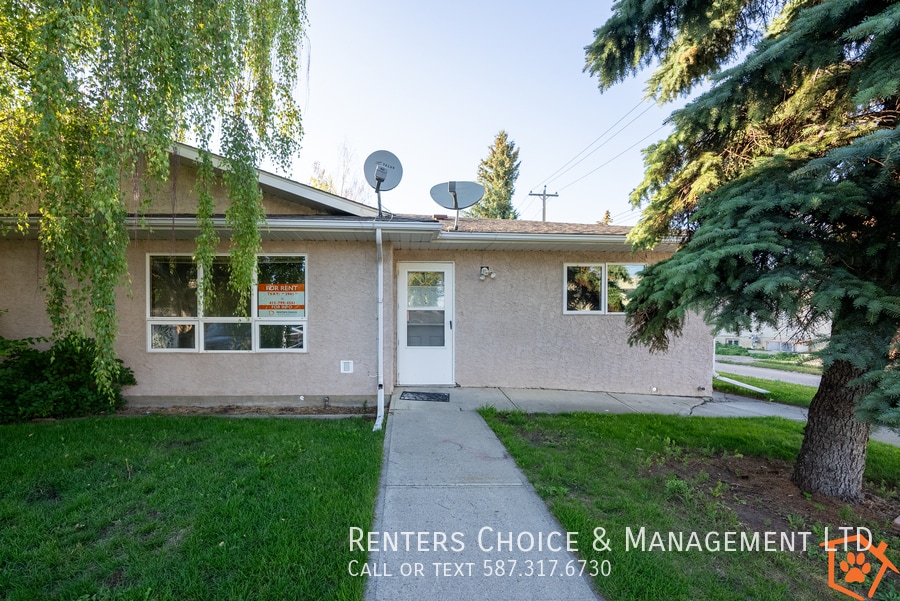 Single Story Unit with Lawn Care Included Ideal for Senior Living in Claresholm, AB - Building Photo