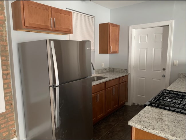 7750 S Essex Ave, Unit Unit 102 in Chicago, IL - Building Photo - Building Photo