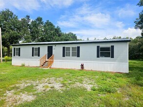 4129 Woodsridge Dr in Polk City, FL - Building Photo - Building Photo