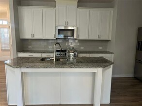 1341 Elderwood Way, Unit 4-4B402 in Cumming, GA - Foto de edificio - Building Photo