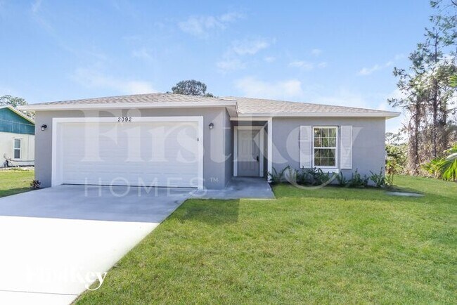 2092 SW Altman Ave in Port St. Lucie, FL - Building Photo - Building Photo