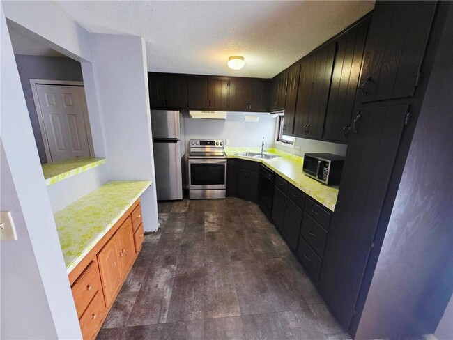 property at 8423 Brunswick Ave N