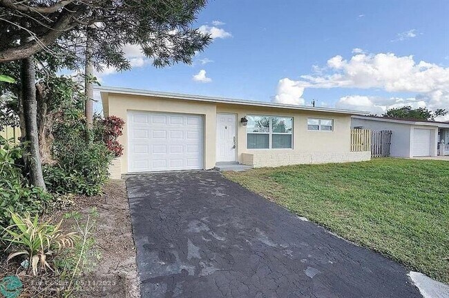 property at 9165 NW 26th St