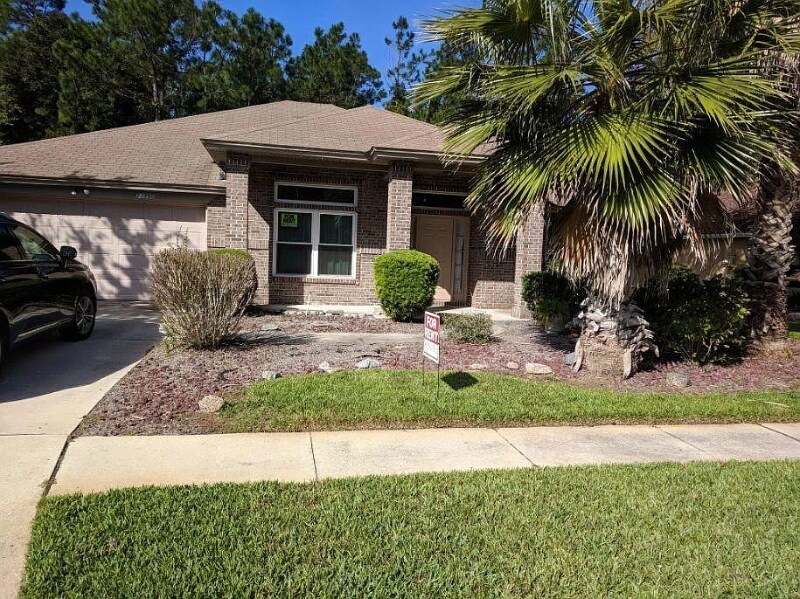 23996 Creek Parke Cir in Fernandina Beach, FL - Foto de edificio