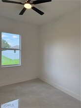 1037 Macy St E in Lehigh Acres, FL - Building Photo - Building Photo