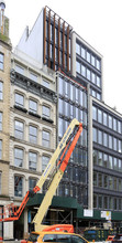25 Great Jones St in New York, NY - Foto de edificio - Building Photo