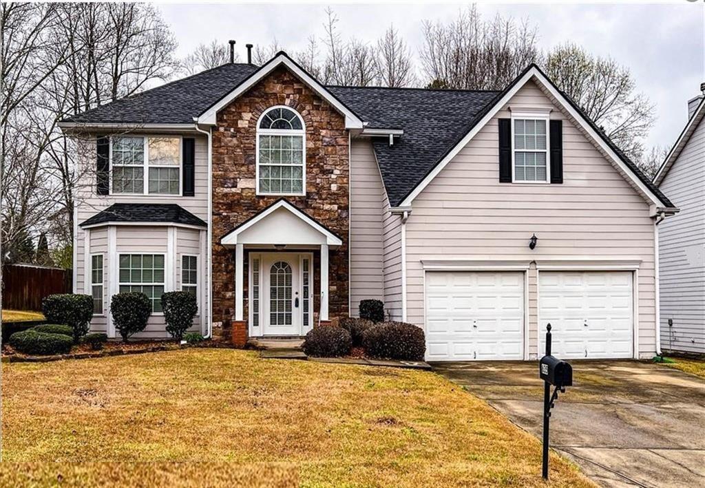 635 Moonlight Way in Suwanee, GA - Foto de edificio