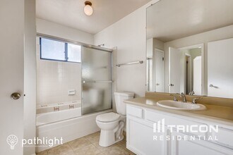 8736 W Ottawa Ave in Littleton, CO - Building Photo - Building Photo