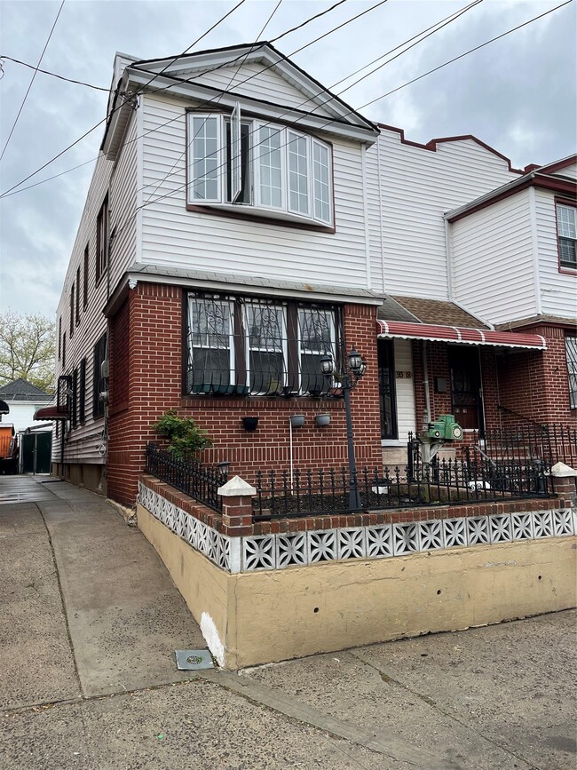 property at 93-18 202nd St