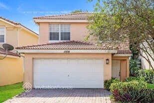 11974 Donlin Dr in Wellington, FL - Building Photo