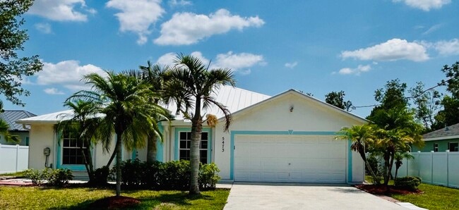 property at 5473 NW Carla Ct