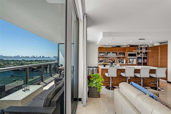 property at 5875 Collins Ave