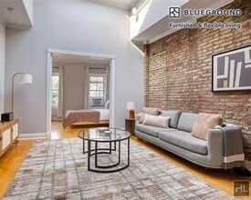 CHRISTOPHER ST., Unit 15 in New York, NY - Building Photo - Building Photo