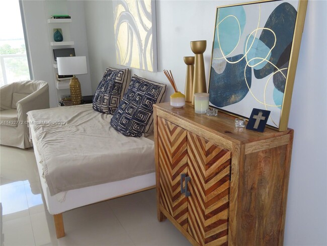 property at 5701 Collins Ave