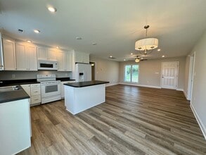 7446 Sturgeon Rd in Warfield, VA - Building Photo - Building Photo