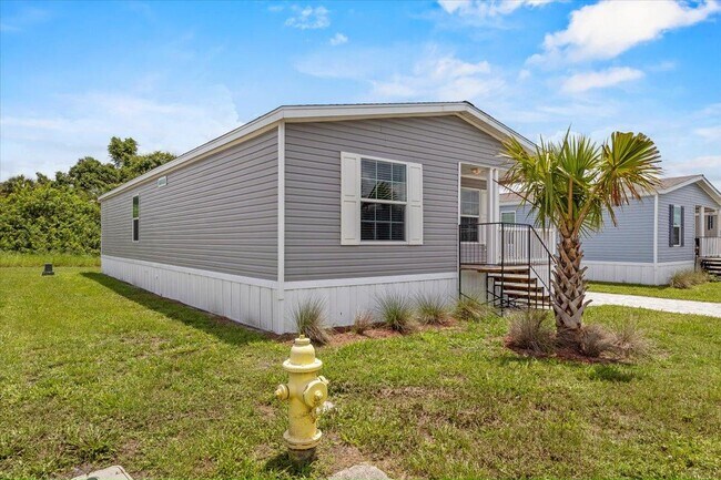 6680 Hidden Oaks Dr in North Fort Myers, FL - Building Photo - Building Photo