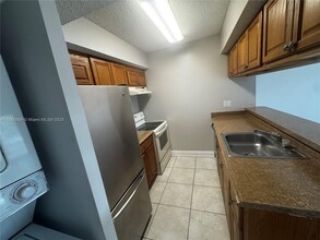 5686 Rock Island Rd in Tamarac, FL - Building Photo - Building Photo