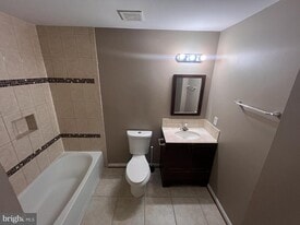 8871 Dunstable Loop in Linton Hall, VA - Building Photo