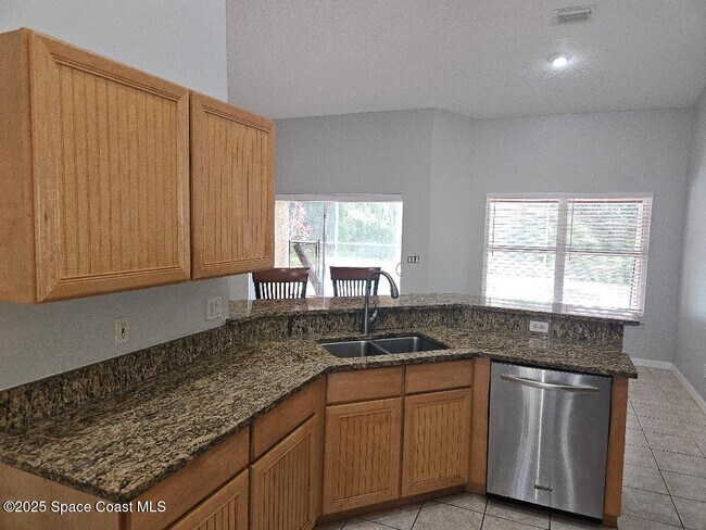 911 Wood Creek Dr in Melbourne, FL - Building Photo - Building Photo