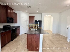 1623 Musgrass Cir in West Melbourne, FL - Building Photo - Building Photo