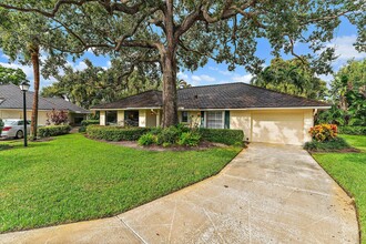 11447 Sandy Oaks Ct in North Palm Beach, FL - Foto de edificio - Building Photo