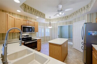 5805 Grande Reserve Way in Naples, FL - Foto de edificio - Building Photo