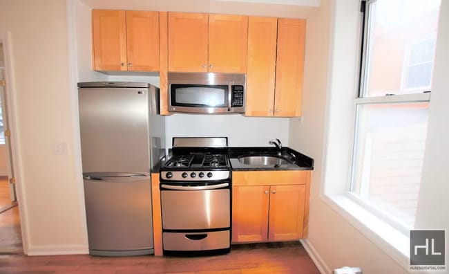 117 W 13th St