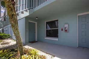 105 Wading Bird Cir-Unit -U-104 in Naples, FL - Building Photo - Building Photo