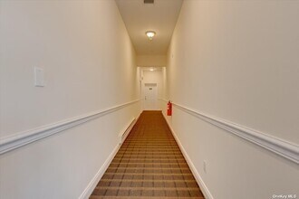 157-161 Post Ave-Unit -202 in Westbury, NY - Building Photo - Building Photo