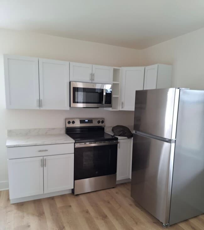 123-125-125 E 2nd St, Unit 123 E 2nd St.