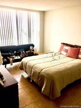 1300 NE Miami Gardens Dr-Unit -719E in North Miami Beach, FL - Building Photo - Building Photo