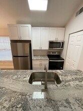 3760 Carmichael Ct in Palm Harbor, FL - Building Photo - Building Photo