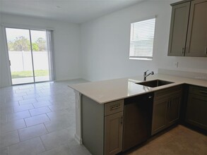 7645 Stone Crk Trl in Kissimmee, FL - Building Photo - Building Photo