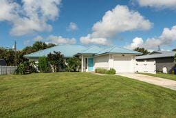 property at 3196 SW Areca Dr