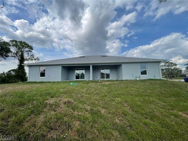 397 Carrillon Ave S in Lehigh Acres, FL - Building Photo - Building Photo