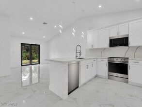 4929-4931 Leonard Blvd S in Lehigh Acres, FL - Building Photo - Building Photo