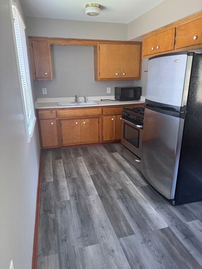 property at 2025 W Warnimont Ave