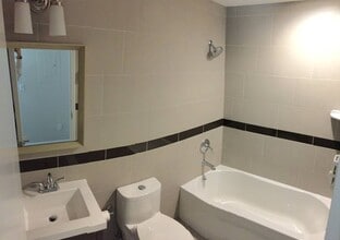 84 Main St, Unit 302 in Mineola, NY - Foto de edificio - Building Photo