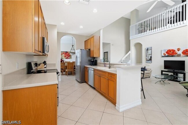 14478 Sterling Oaks Dr in Naples, FL - Building Photo - Building Photo