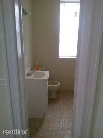 1105 Walnut Ave-Unit -Apt 1 in Baltimore, MD - Building Photo - Building Photo